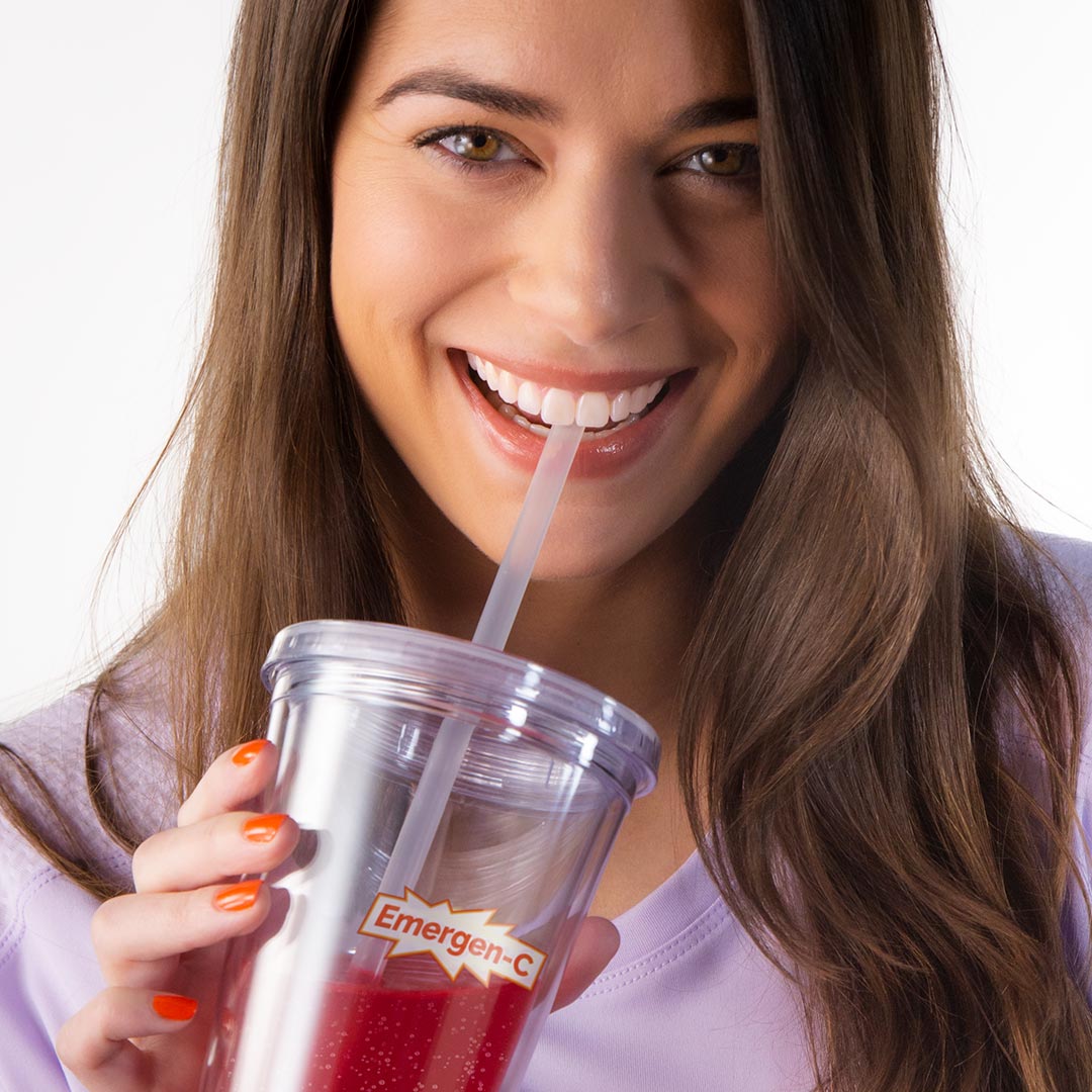 model sipping emergen-c raspberry