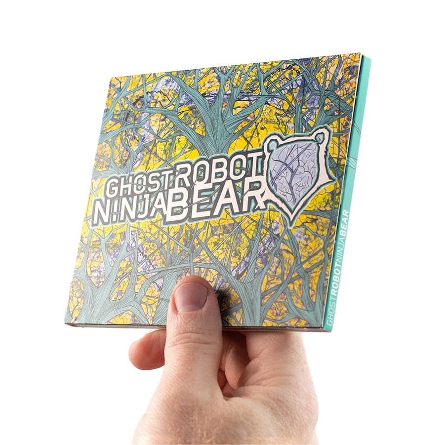 hand holding ghost robot ninja bear CD showing the cover
