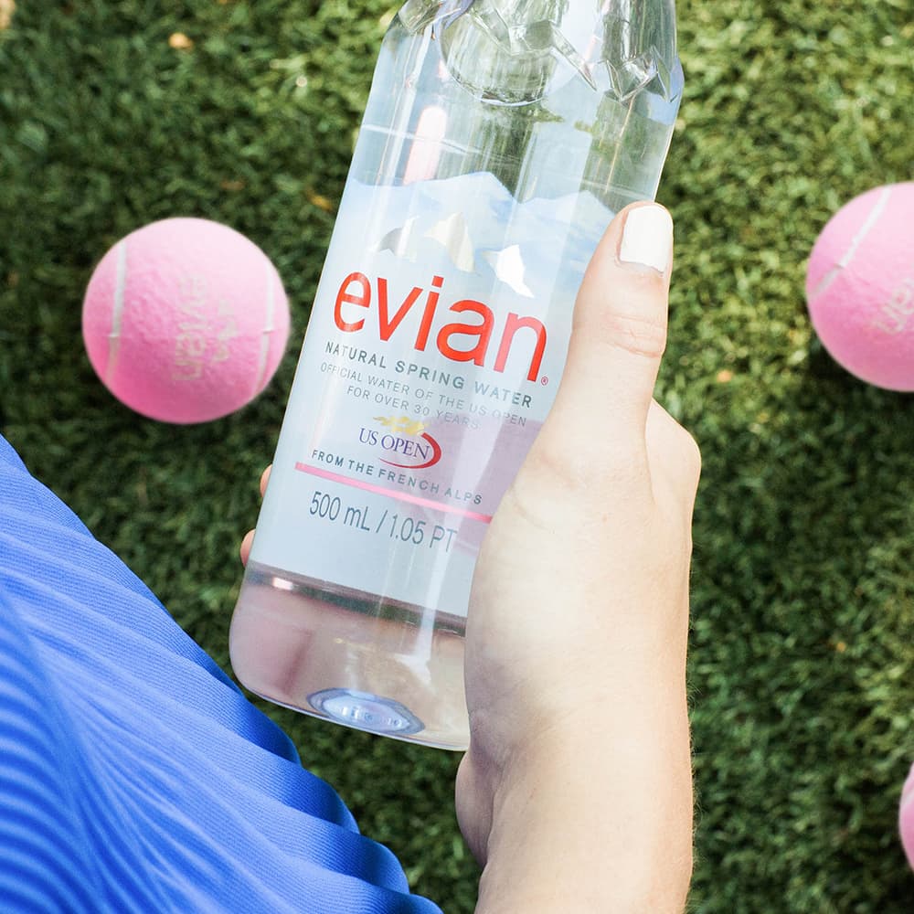 evian bottle in hand