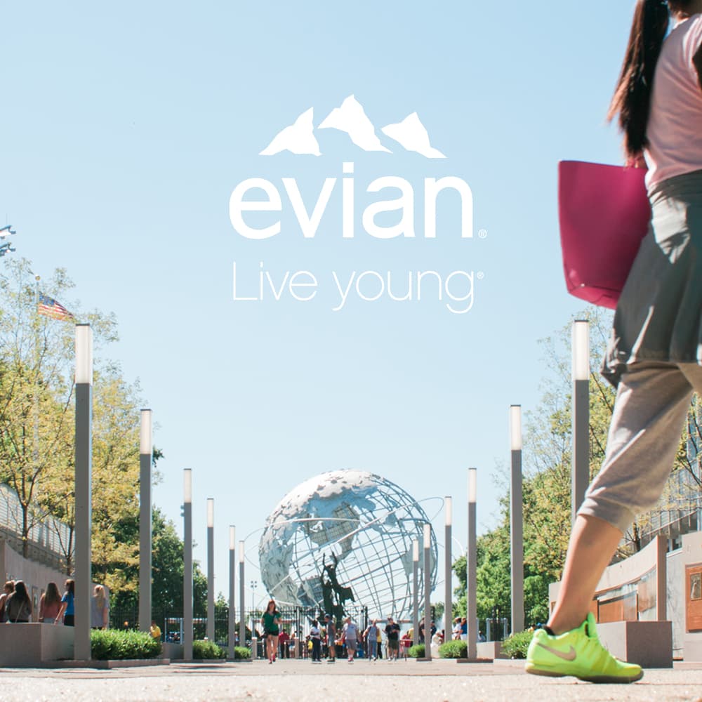 World's fair globe in the background with evian logo in the foreground